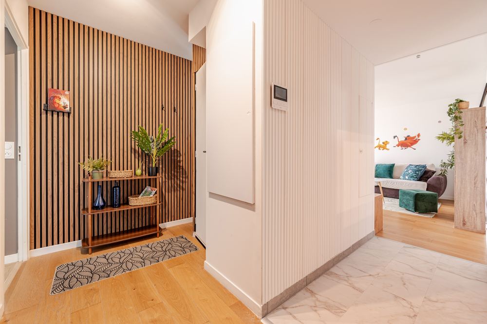 Entrance hallway with wood-slat wall