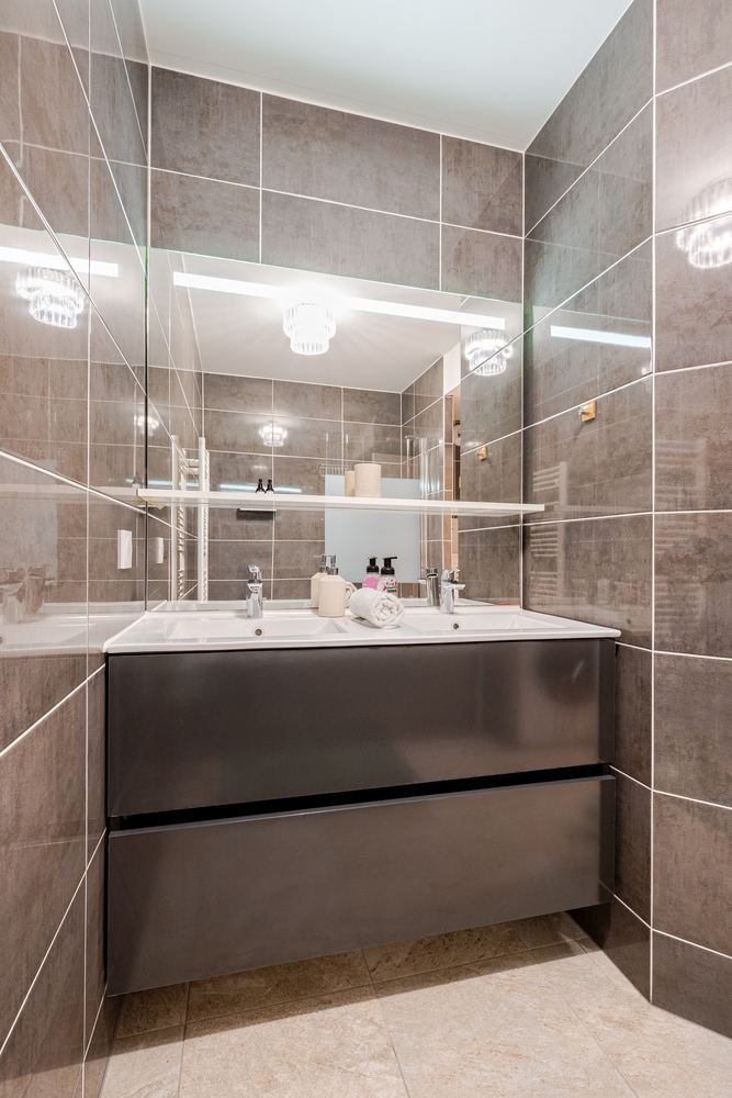 Bathroom vanity with large mirror