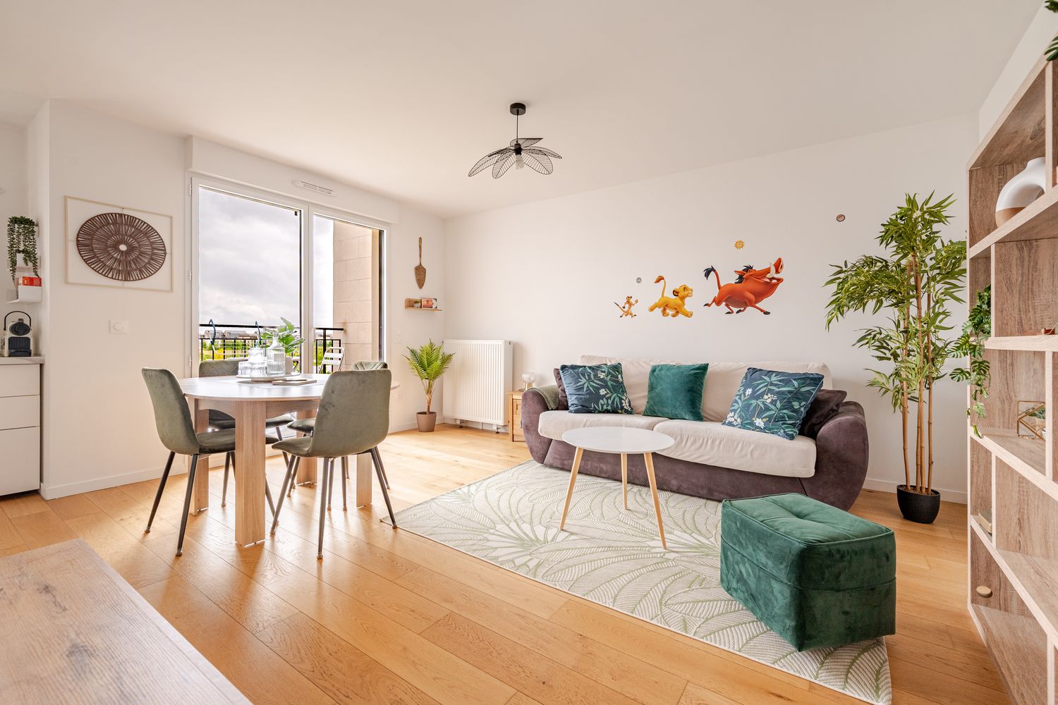 Bright living room at The Lion Suite with balcony view